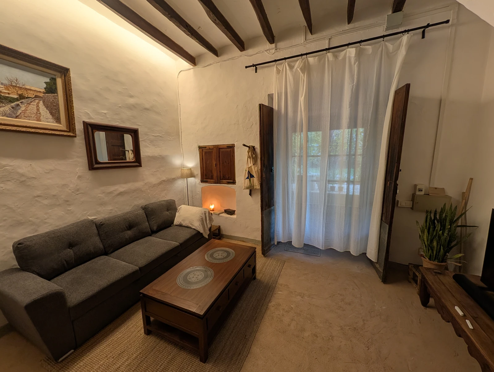 The entrance hall and living room of Can Carabina